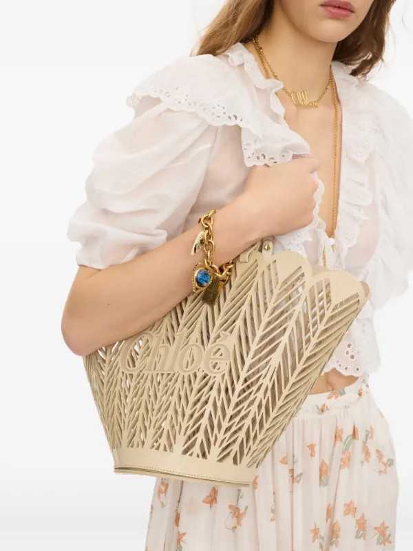 Soleil cut-out logo-debossed tote bag | Farfetch Global