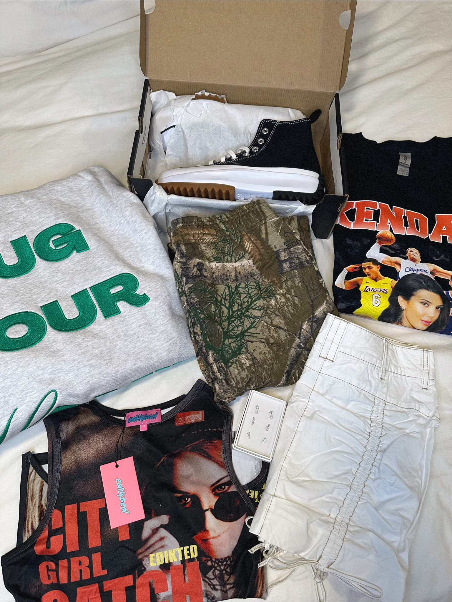 Hoodie/camo pants are from thankscowboy. Kendall shirt is simolife store on Etsy and graphic top is edikted! 

#LTKU #LTKstyletip #LTKFind