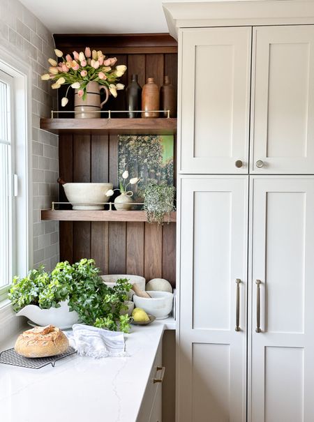 It’s always so fun to decorate the kitchen. These faux tulips are the best! And my cabinet hardware steals the show  

#LTKHome #LTKFindsUnder50 #LTKFindsUnder100
