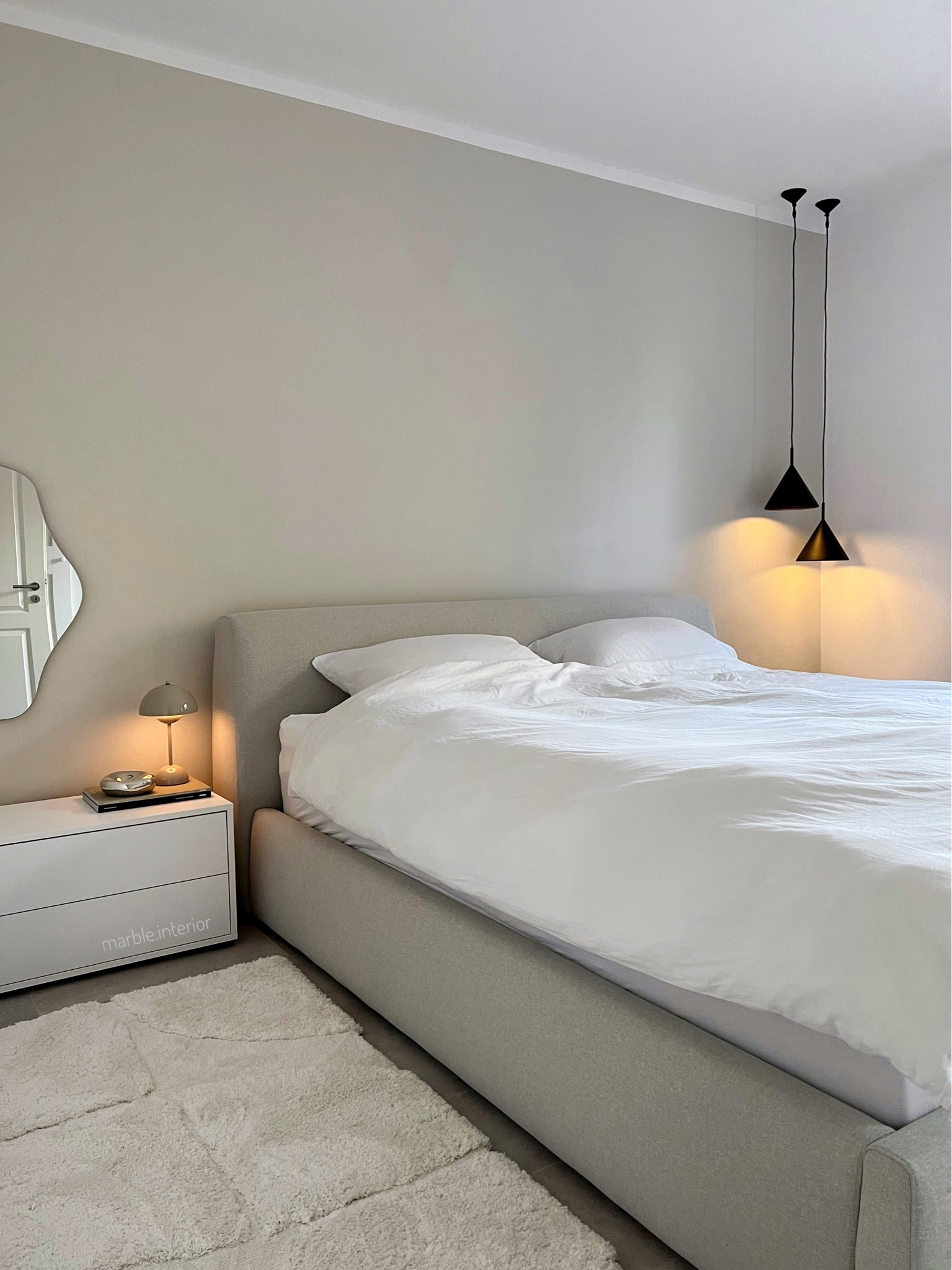 Cozy Bedroom Schlafzimmer Bett bed Teppich Kommode sidetable Nachttisch westwing Spiegel Lampe Leuchte Black decor neutral Home white interior minimalism Minimalismus Deko Dekoideen Einrichtung Bettdecke polsterbett Tischlampe tablelamp kissen 

#LTKeurope #LTKstyletip #LTKhome