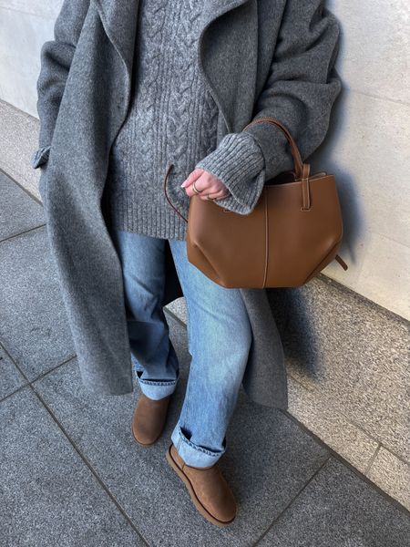 Grey knit jumper, long grey coat, blue straight jeans, mini uggs, leather handbag

#LTKeurope #LTKstyletip #LTKSeasonal