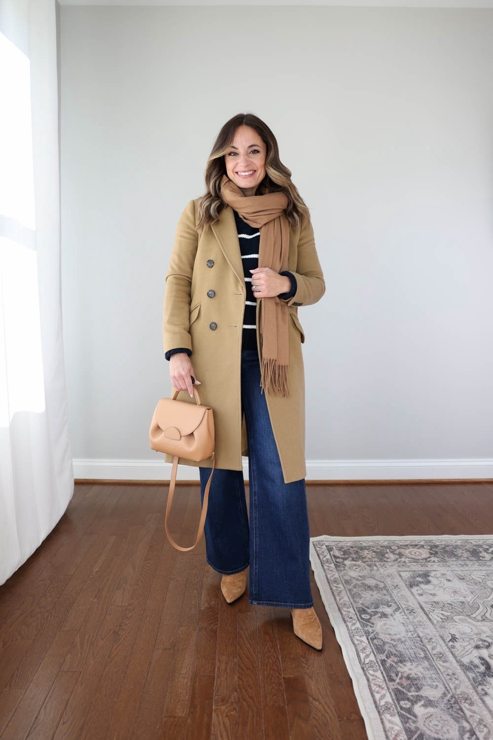 Wide leg jeans styled for all seasons! 

Quince Bella Wide Leg 
Size Wearing: 24 x 28” in midnight blue 
Fit: true to size - shrinks in the wash
Inseam: 28” (30” and 32” options available) 
Rise: 10.5” in classic 
Fabric & Care: 94% organic cotton, 5% elasterell-p, 1% | Machine Washable
Sweater (Quince): xs not available in blue and white 
Coat (J.Crew): currently unavailable 
Boots (J.Crew): tts 
Scarf (Amazon) 
Bag (Polene): linked an Amazon option 

My measurements for reference: I’m 4’10” and 105lbs. My bust, waist, and hip measurement is 32”, 24”, and 36”.

#LTKPetite #LTKSeasonal