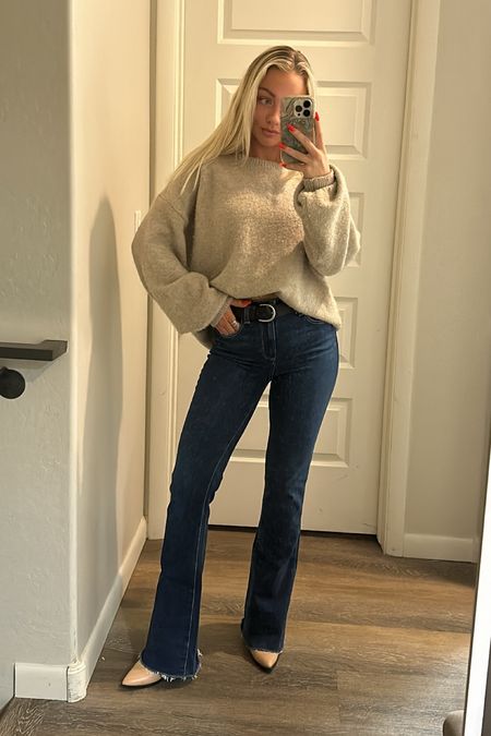 wearing a small sweater
25 jeans