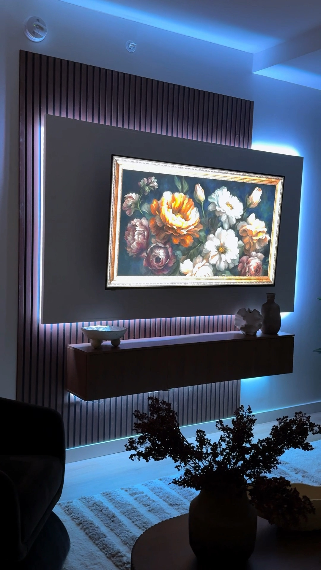 📺 I wanted my living room to feel elevated, intentional, and cozy almost like my own little movie theater moment right at home. This feature wall with wood panels, LED lighting, and a floating console completely changed the vibe of the space.

Sometimes the smallest design upgrades make the biggest difference in how a home feels, and this wall did exactly that for me.

Follow me on Instagram for daily content and join my broadcast channel for behind-the-scenes updates:
Instagram: @heyitstyhill

#LTKSeasonal #LTKHome #LTKvlog