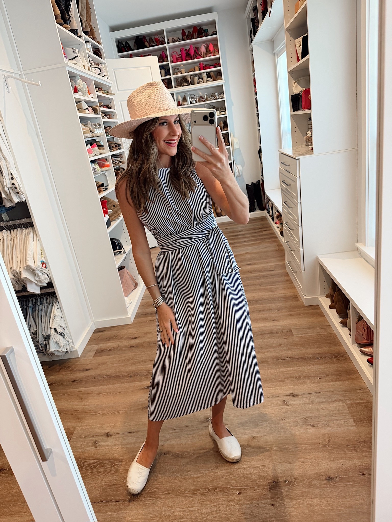 In a small dress, espadrille flats, hat and accessories- fits tts.

#LTKootd #LTKTravel #LTKSeasonal