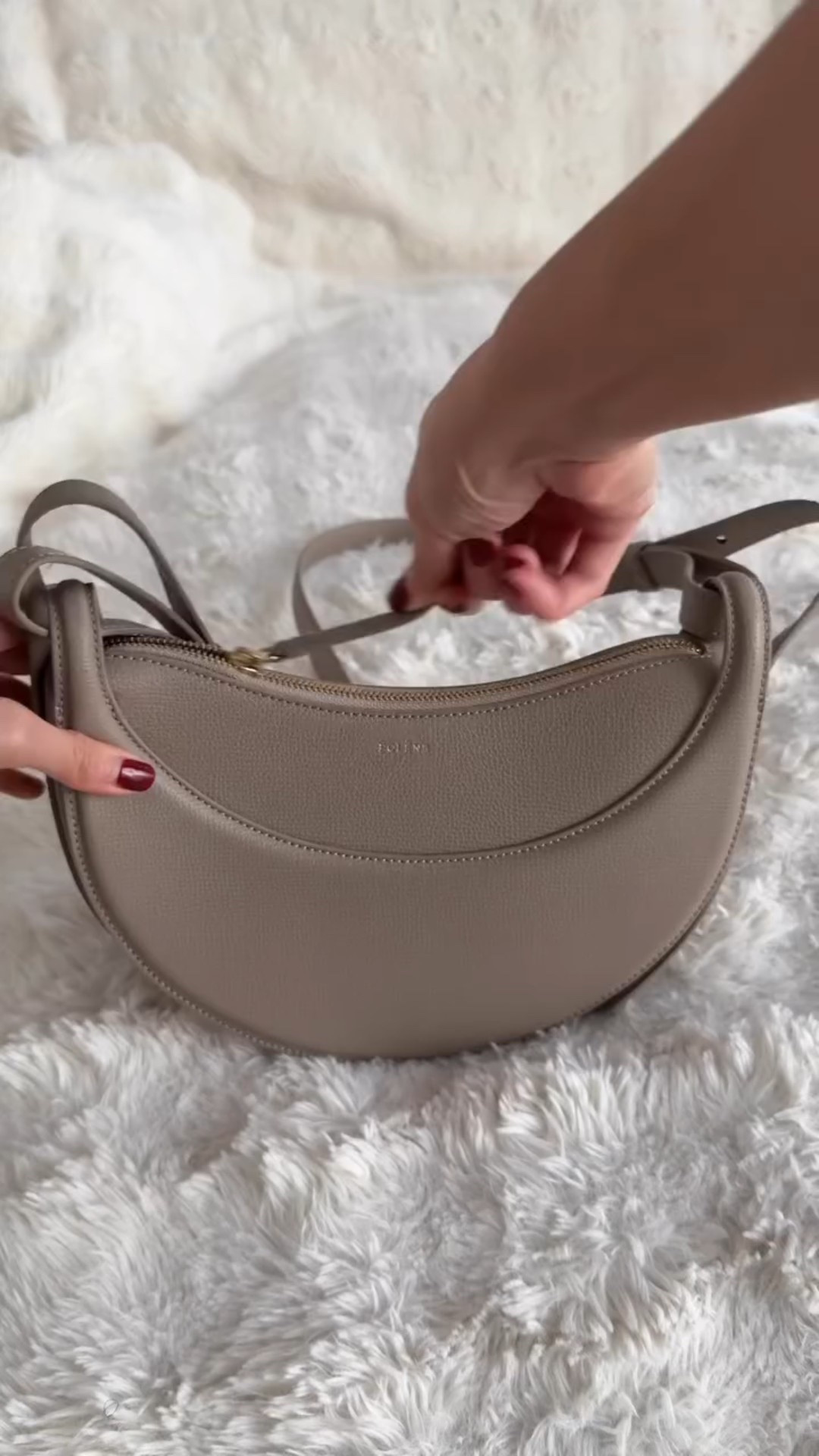 #ASMR: What’s in my Numéro Dix @polene_paris bag? It may look small, but I promise, I can fit a LOT in here! ✨

- @beautyofjoseon_official sunscreen (Yes, SPF is a year-round essential, folks)
- @laneige_eu Europe lip sleeping mask (Hydration = non-negotiable)
- @hellokittyeu mirror that reminds me of my 2006 flip phone (Because, why not?)
- @americanexpressuk (Get 100k bonus points with my referral link in bio 😉)
- Tiger balm (East Asians, if you know, you KNOW)
- @apple AirPods Pro (Music is life)
- @rhode skin lip tint in Toast (Perfection in a tube)
- Hair bands (Essential for any hair emergency)
- @memoparisofficial Marfa (The scent? Pure magic) 

👜 #WhatsInMyBag #BagEssentials