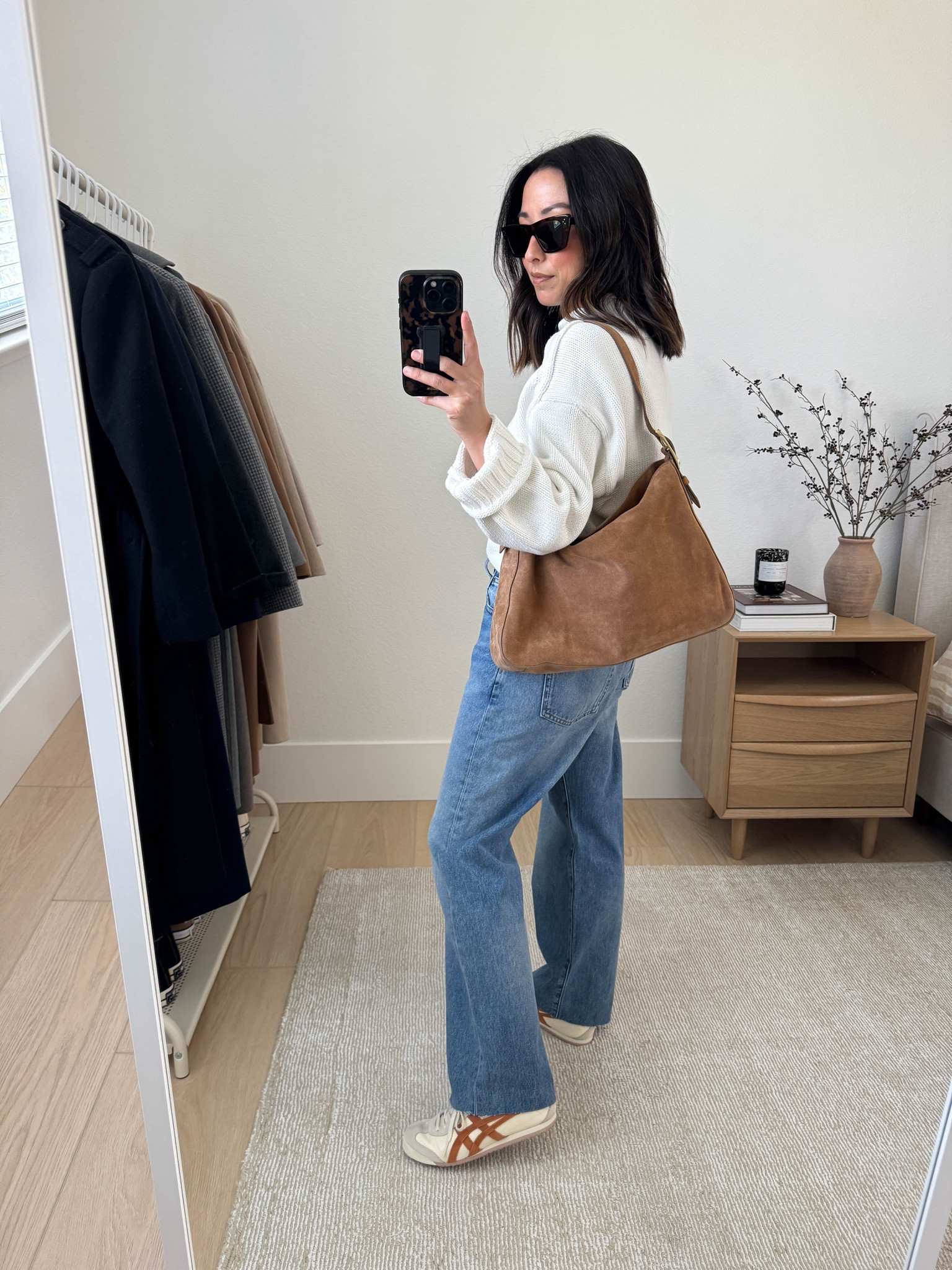 Fall outfits from J.Crew. J.Crew rollneck sweaters are back and better than ever! The fit is slouchy and roomy, so take your true size. I'm wearing the xs. These jeans are also fantastic. The wash is very vintage-like. These are more of a mid rise for me though. Also, in the 25, and they're roomy, so could technically size down. 

J.Crew rollneck sweater xs
J.Crew relaxed jeans 25 petite, but still needed to cut hems
Onitsuka Tiger sneakers 4 mens
J.Crew bag
Celine sunglasses


#LTKSeasonal #LTKItBag #LTKPetite