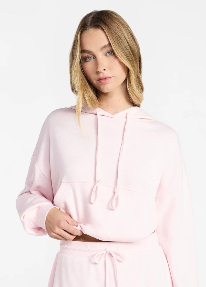 Casually cute with a side of cozy, the No Boundaries’ Bubble Hem Drawstring Hoodie is the soft launch everyone’s obsessing over. This hoodie features a bubble hem that gives your fit a little bounce (without being over the top), plus a classic drawstring hood for extra warmth and a kangaroo pocket for all your daily needs. Soft, easy, and instantly trend-forward, pair this hoodie with the Bubble Hem Drawstring Skirt (sold separately) for campus days, brunch plans, or just leveling up your basics. Only at Walmart.

#LTKSeasonal #LTKootd #LTKmomlife