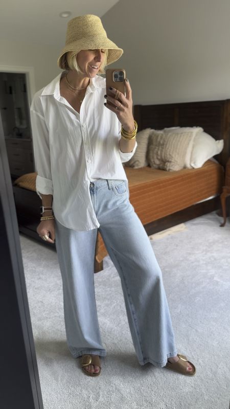 Effortless + modern! 
A light weight white button up shirt is a staple piece I reach for most this time of year! It’s breathable, comfortable + adds a polished touch! These wide leg jeans are incredibly soft + look modern. I used my hat + accessories to bring a styled look to these summer basics 

#LTKFindsUnder100 #LTKStyleTip #LTKOver40