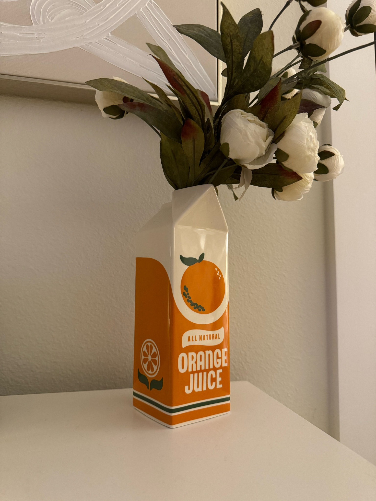 I love this vase so much. It’s so fun and different 🍊🧡

#LTKGiftGuide #LTKfindsunder50 #LTKhome