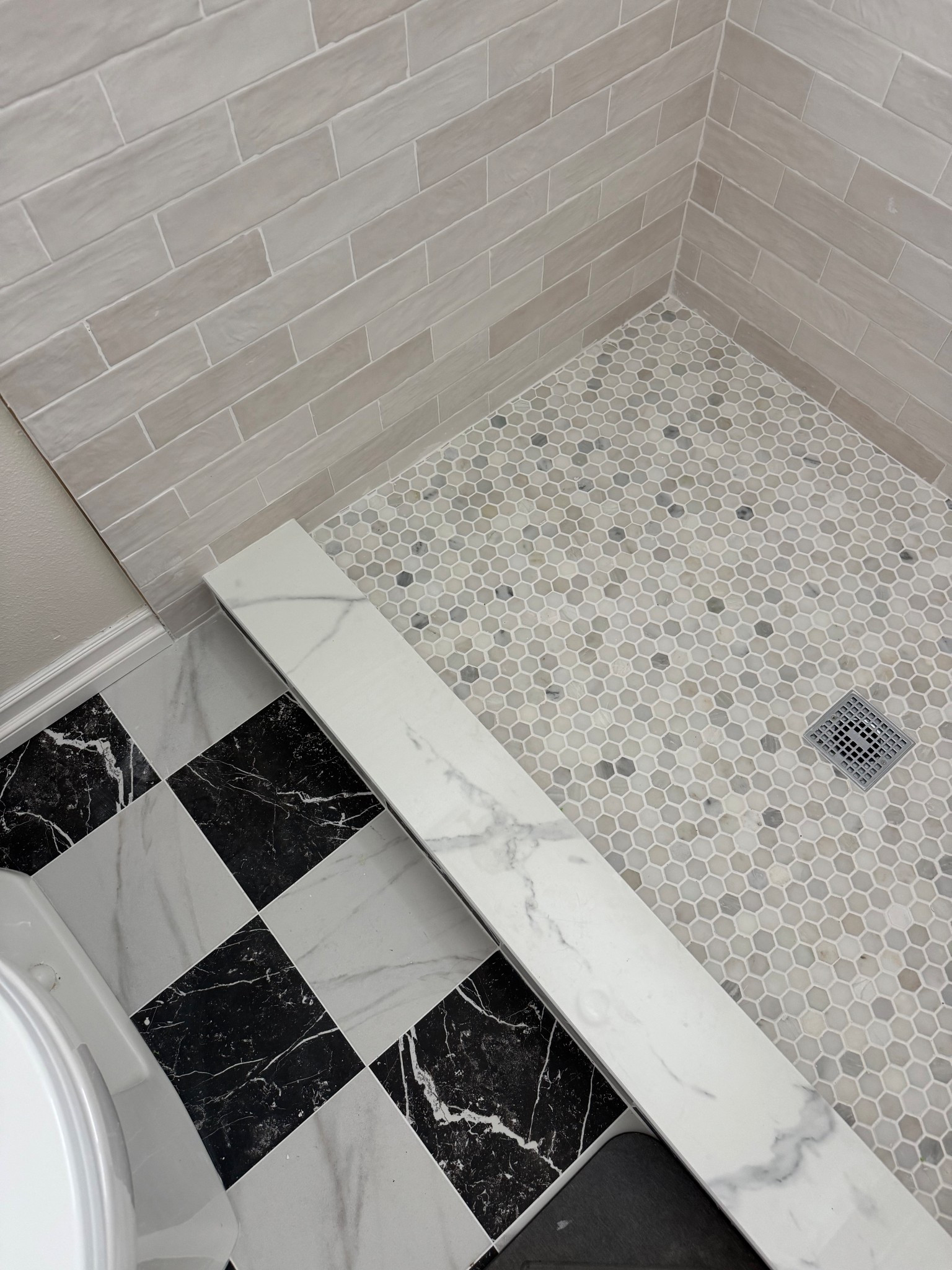 A look at it all together. The shower tile floor is the 1 in. and I think it looks so much better smaller than bigger! The shower dam (the marble) isn’t linked because i just asked for a marble slab. Didn’t pick anything in particular! 

#LTKHome
