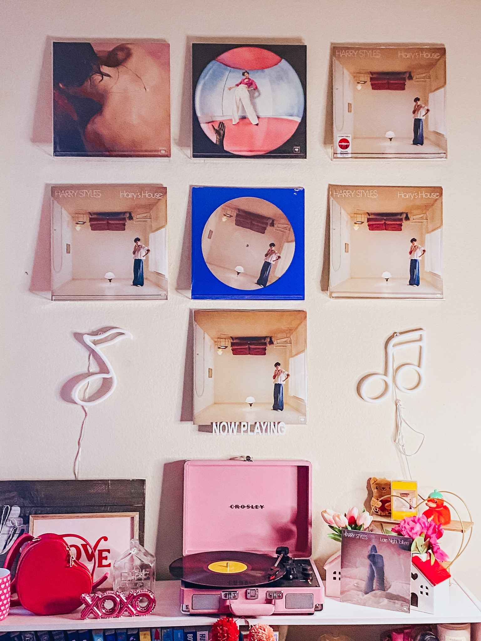 Harry’s House Shrine! 🏠 Here is what my vinyl wall has looked like for the past few weeks. 📀 I think I have this album on ever form of media it was sold on. 🎶 From cassette tape to vinyl to CD. 💛 It’s one of my fave albums and I just adore Harry Styles. 😊 What artist do you own most on vinyl? 🤔
