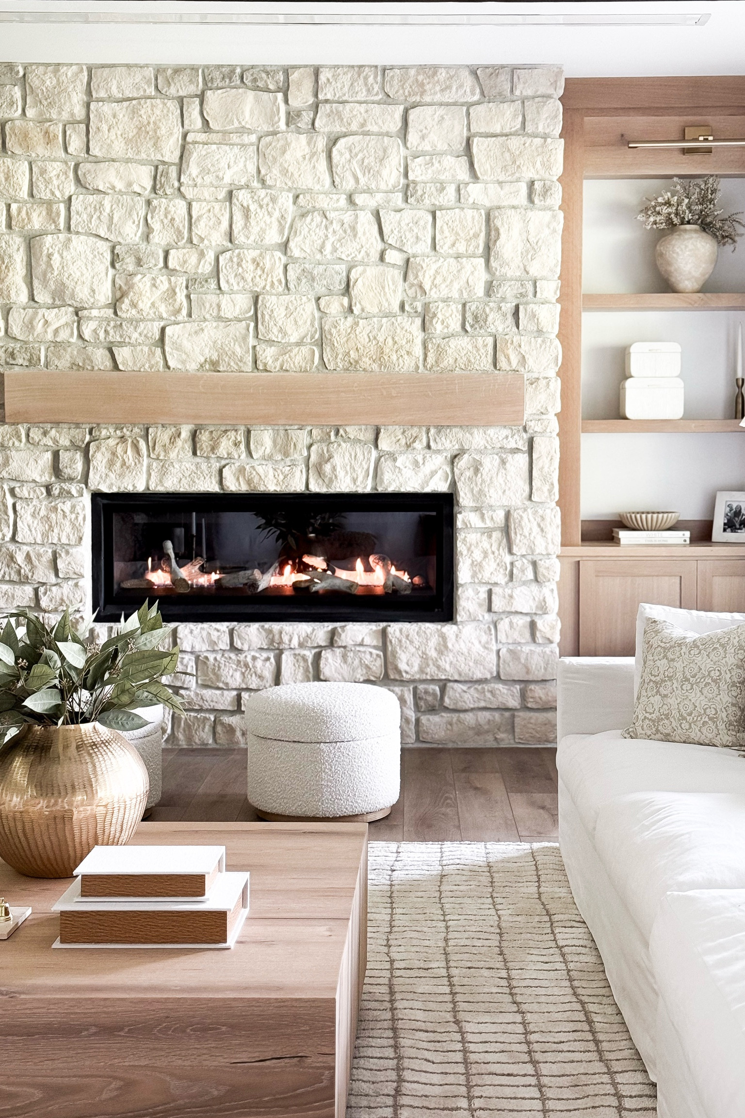 I absolutely love how our basement turned out! It's so light and airy, now one of the coziest spots in our home.

My ottomans are currently on sale and my rug is 48% off today!

Home, home decor, modern home, neutral home, organic home, ottoman, coffee table, built ins, shelf decor, faux greenery, faux florals, area rug, white oak

#LTKSummerEdit #LTKHome #LTKSeasonal