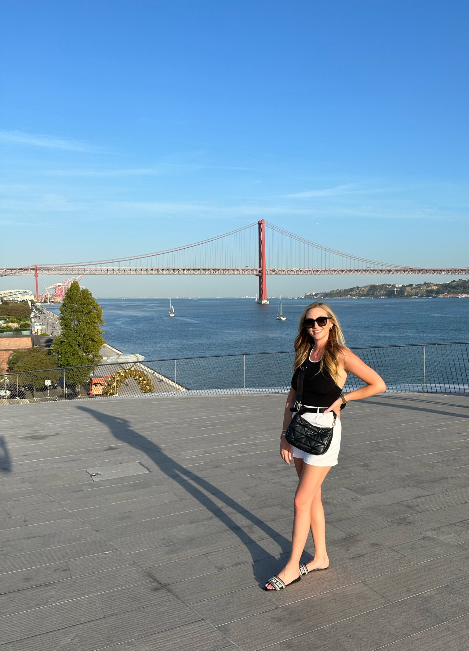 Two toned halter neck tank from Dissh 
Prada bag 
Slides from Dior 
Isabel Marant belt 
White shorts I can’t link are from Zara! 

#LTKtravel #LTKstyletip #LTKshoecrush