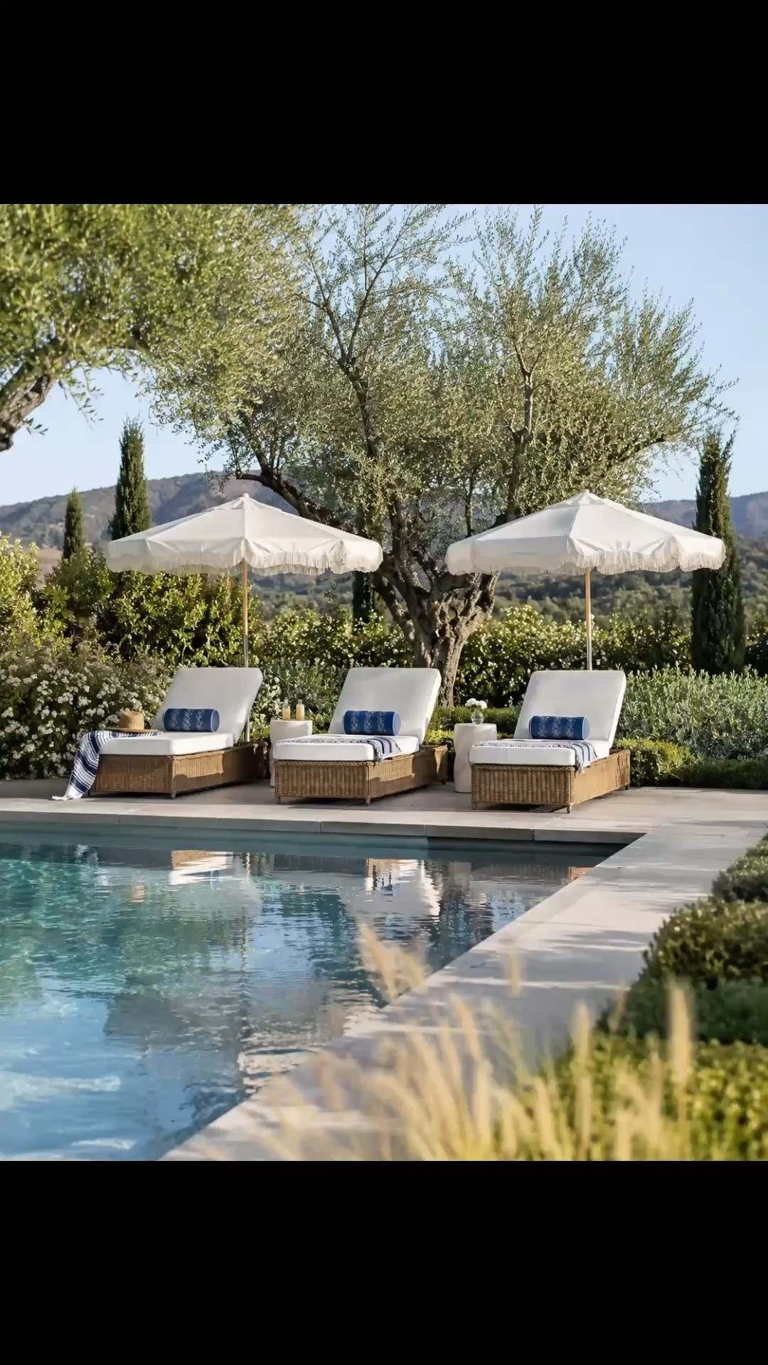 Gorgeous chaise lounge chairs and umbrellas for a relaxing poolside patio! Neutral aesthetic, patio umbrellas, backyard, outdoor furniture, patio decor, bolster pillows, wicker, rattan, organic modern, minimalist, transitional, Restoration Hardware style, Amazon home, McGee, Target, Wayfair home, summer decor, quiet luxury

#LTKsummer #LTKhome #LTKsale