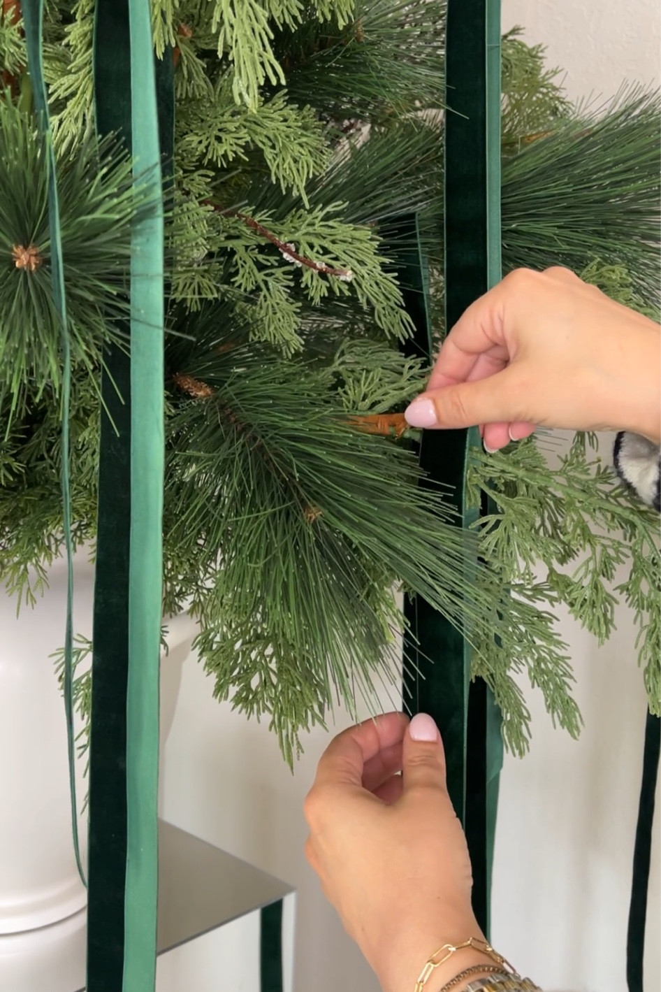 Use 1” green velvet ribbon to create long strands at various lengths 

#LTKHoliday #LTKSeasonal #LTKHome