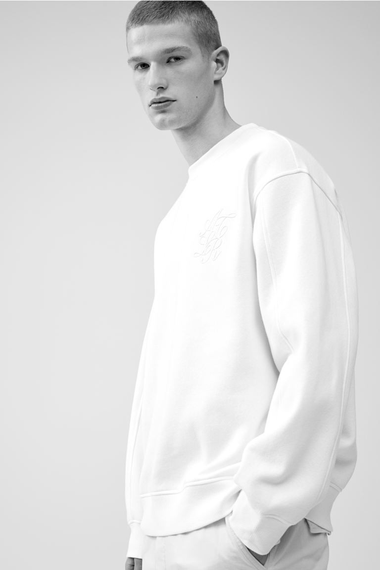Relaxed Fit Appliquéd Sweatshirt - Cream - Men | H&M US | H&M (US + CA)