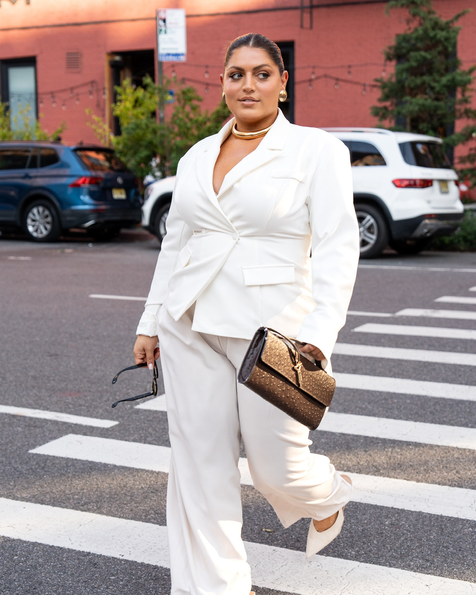 strutting around nyc in this all white suit look!!💃🤍 this was one of my fav looks! still classy and yet snatcheddd and fire🔥 add some gold jewelry, statement pieces, and this cute brown clutch to tie it all together! couldn't be more obsessed with this look besties👏🏼

#LTKPlusSize #LTKMidsize #LTKNYFW