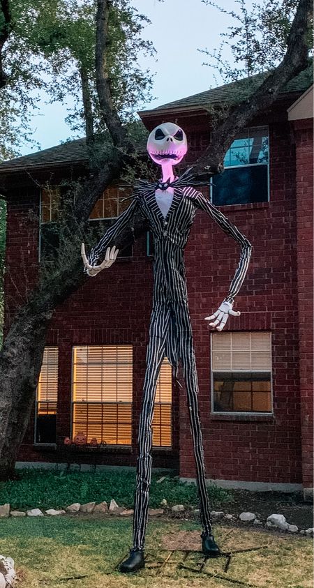 The most epic Halloween decoration you’ll ever see or need. A 13 ft Jack Skellington towers over your house, lights up and sings! 

#LTKhome #LTKSeasonal