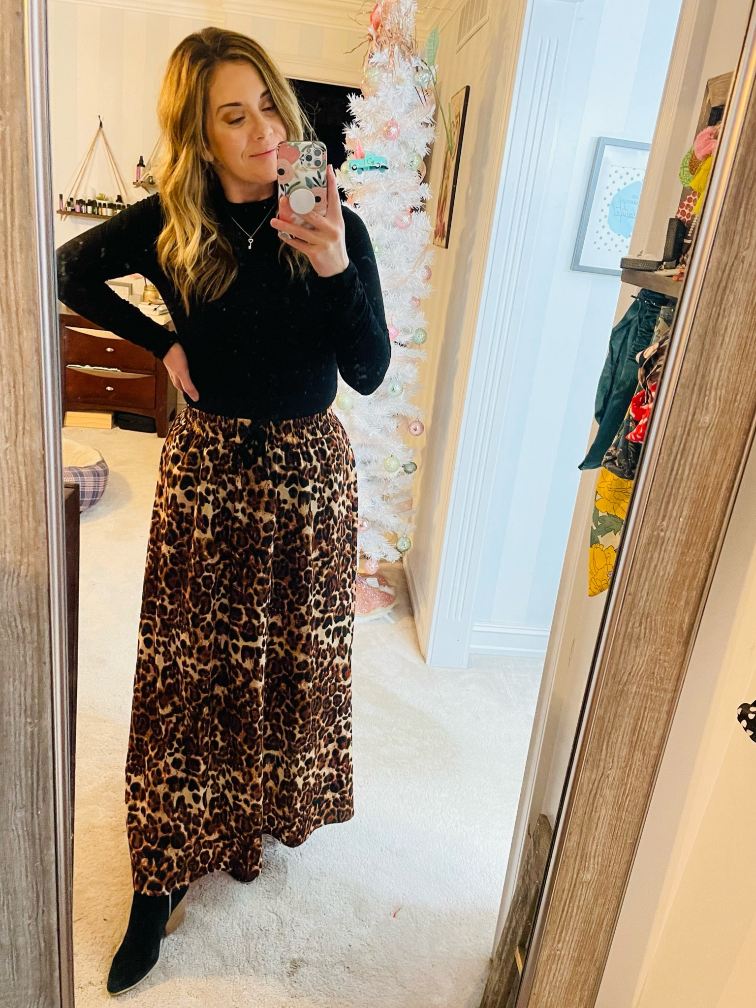 This is one of my favorite maxi skirts paired with a long sleeve blouse and booties makes it a great winter church outfit. 