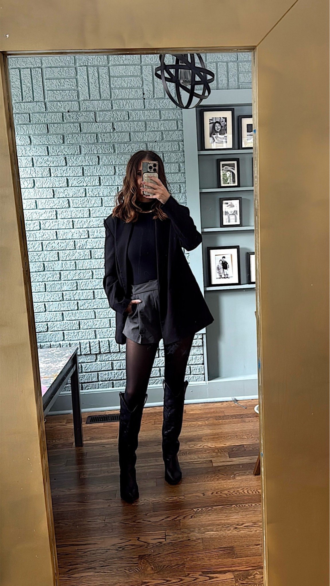 Pleated shorts with oversized, black blazer ￼

#LTKootd #LTKSeasonal #LTKOver40