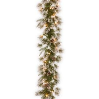 9’ x 10” Pre-lit Feel Real® Liberty Artificial Christmas Pine Garland with Snow and Pine Con... | Michaels Stores