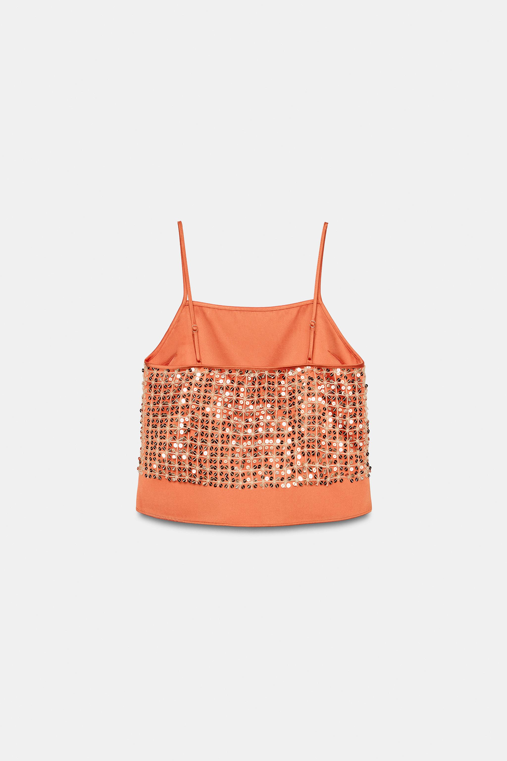 Model height: 183 cmTop with a straight neckline and thin adjustable straps. Satin fabric with se... | Zara UK