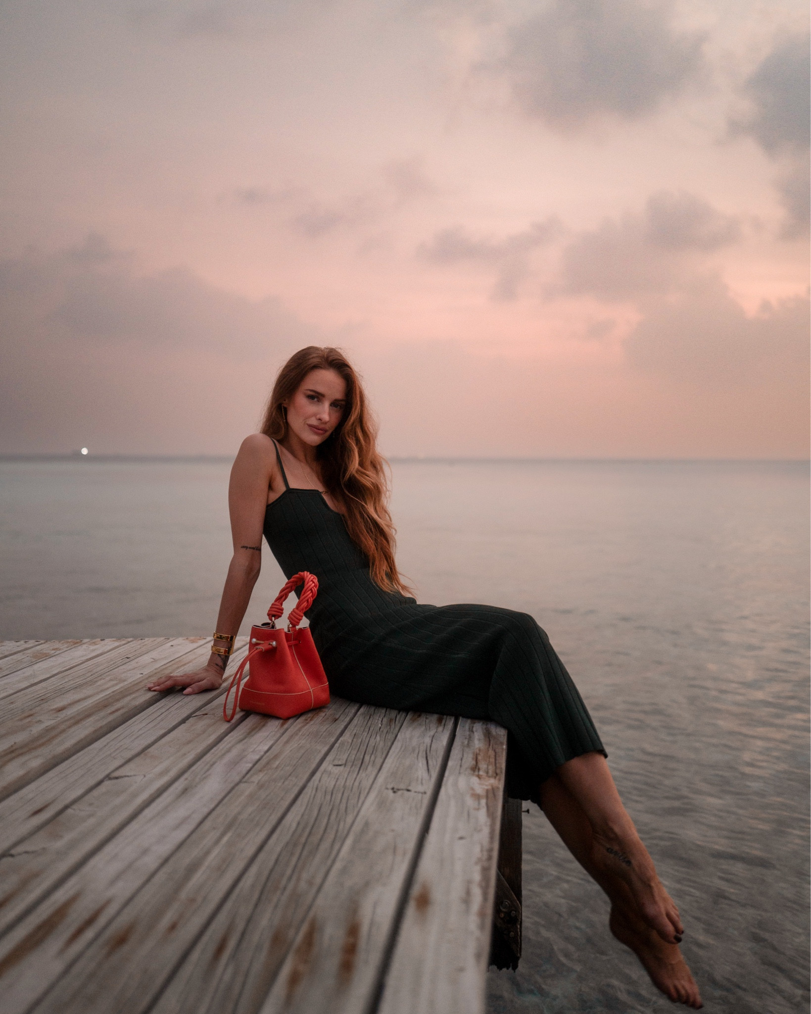 Little green dress and orange bag combo in the Maldives 

#LTKluxury #LTKtravel #LTKdatenight