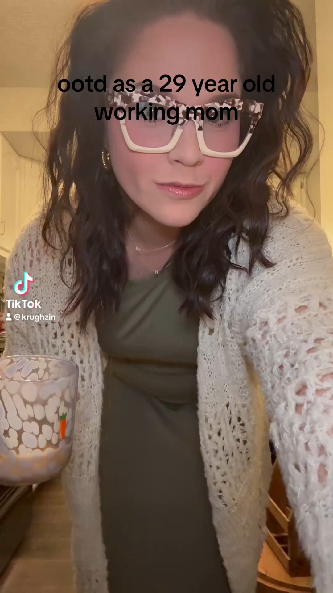 outfit of the day as a 29 year old working mom 
green dress, midi dress, green midi dress
cream sweater, sweater, oversized sweater 
tortoise glasses
gold bead bracelet, beaded bracelet, gold accessories 


#LTKFindsUnder50 #LTKWorkwear #LTKMidsize