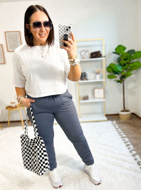 The comfiest athletic pants from Amazon!  Lots of colors!  XL in line. Loving this grayish blue color for spring!  XL crop tee. Love my new checkered corduroy tote bag. Sized down a half size in my converse platform sneakers!  Loving these! 

#LTKSeasonal #LTKmidsize #LTKfindsunder50