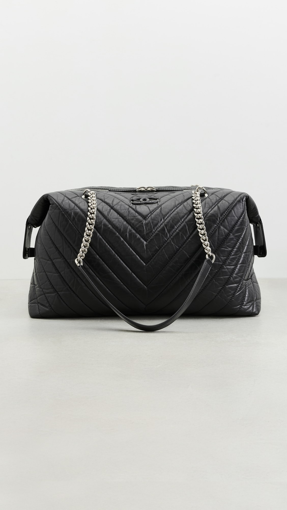 Chanel Black Calfskin Chevron Quilted Duffle Bag | Shopbop