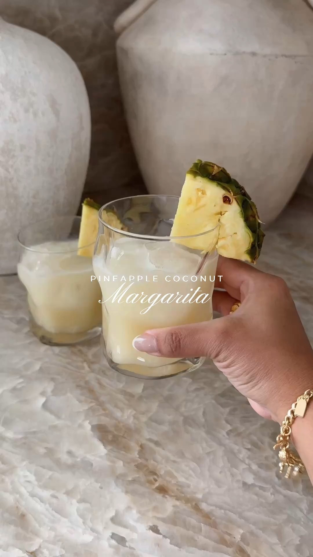 Coconut pineapple Marg — because your taste buds deserve a vacation! 🍍 🥥 

Recipe for 2 drinks:
	•	4 oz tequila
	•	2 oz triple sec
	•	Juice of 1 lime
	•	1 oz cream of coconut
	•	Top with pineapple juice
Shake with ice and pour into a glass (bonus points for a pineapple garnish)

#homemadecocktails #margaritatime #tropicalvibes #happyhourathome #gatheringwithjen #margarita #cocktailglass #cocktailshaker #amazon #amazonfind

#LTKHome #LTKFindsUnder50 #LTKWatchNow