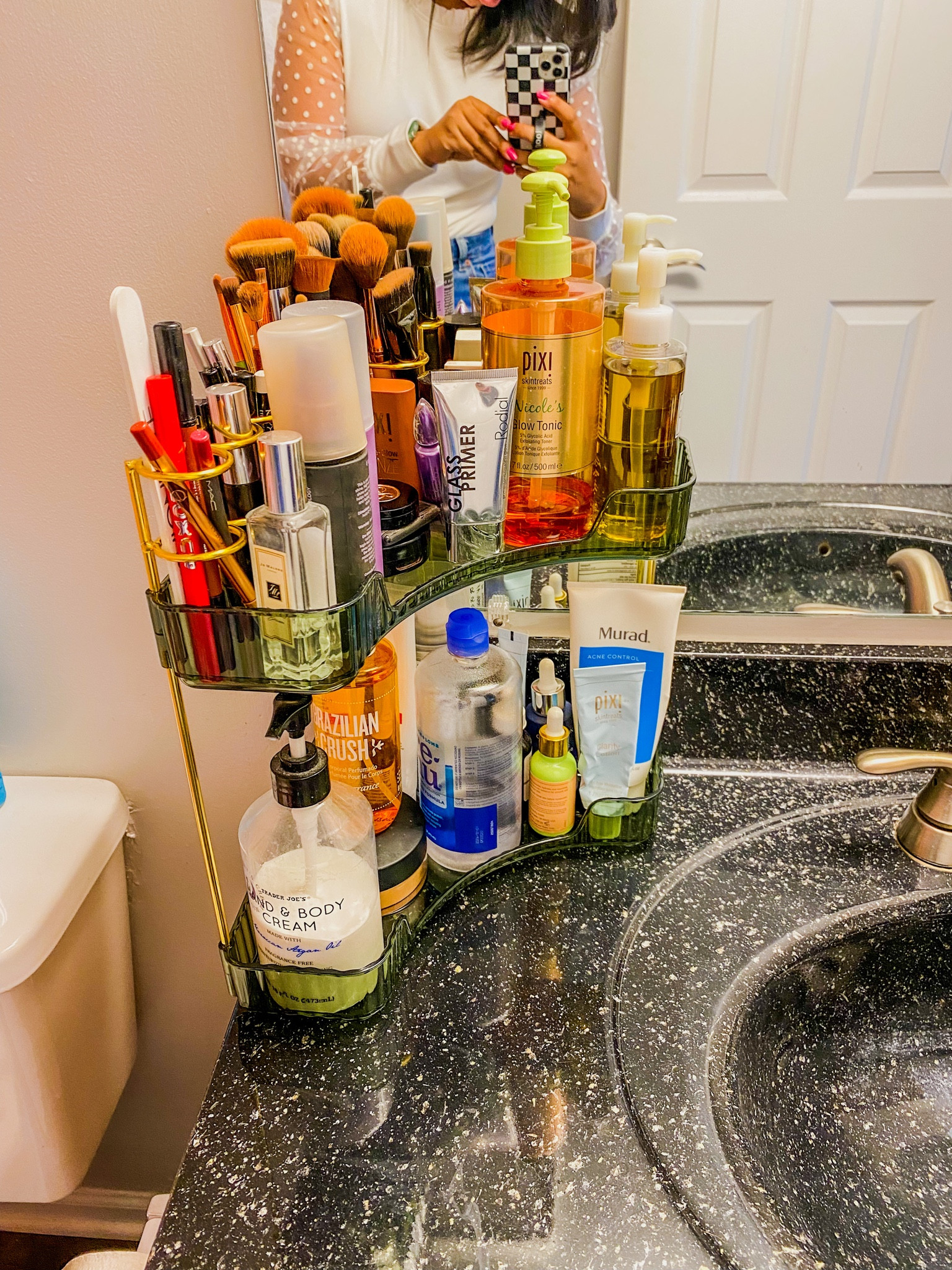 A two tiered beauty product organizer for countertops. Available in more colors and in a three tier. This is very easy to assemble and has places for eyeliners, brushes, and beauty blenders. // makeup organizer, perfume organizer, bathroom organization, counter organizer, skincare organization 

#LTKhome #LTKbeauty #LTKfindsunder50