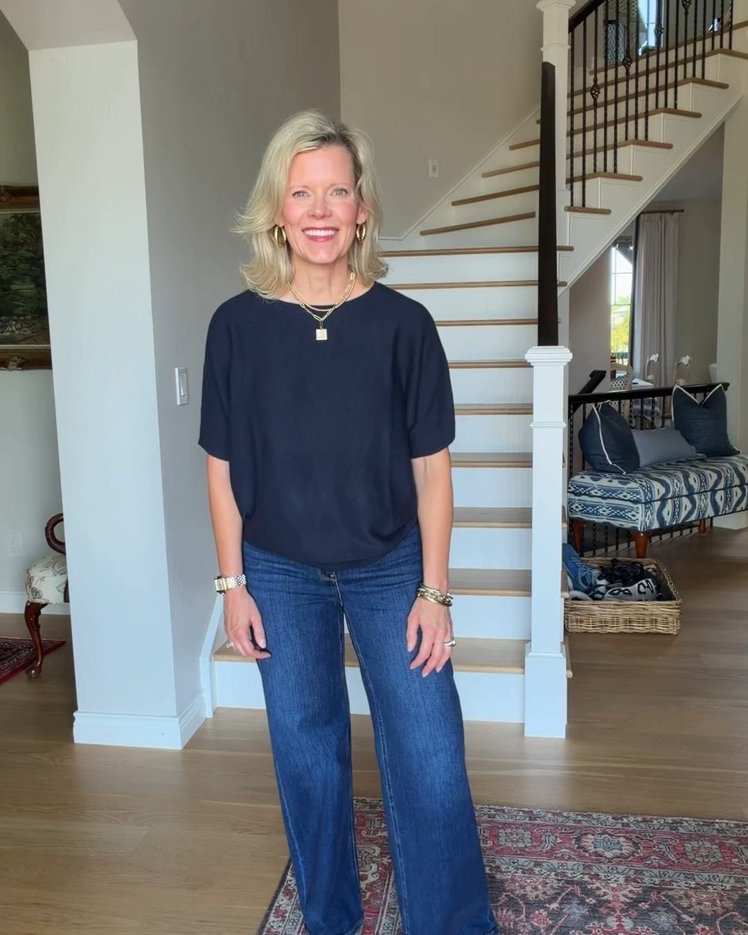 I bought this same @Quince  sweater in black a few years ago and wore it so much. It is lightweight, comfortable and looks great dressed down with jeans or dressed up with slacks or a skirt for a work outfit. If you are in between sizes, I would size down. It comes in a bunch of colors! Wearing some of my favorite $50 jeans that are also from @Quince. They run true to size. You can’t beat the quality and the price. ￼￼