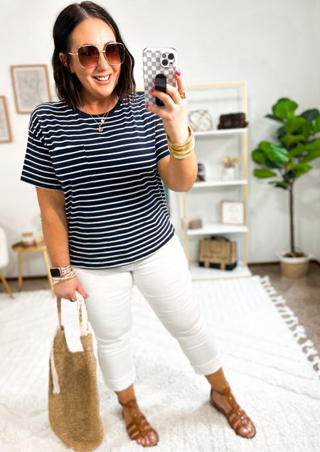 Walmart boyfriend tees are back in stock!  Love this navy and white striped one. Wearing a large. Large and XL works great in these tees. Size 16 capri length white jeans. I don’t love how these fit on me but worth a try for the price. Sandals fit tts and these are very comfortable! #walmartfinds

#LTKfindsunder50 #LTKSeasonal #LTKmidsize