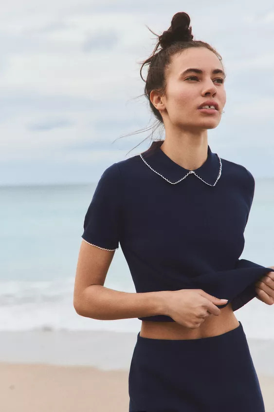 Short sleeve lapel collar top. Contrasting trim detail. | Zara US