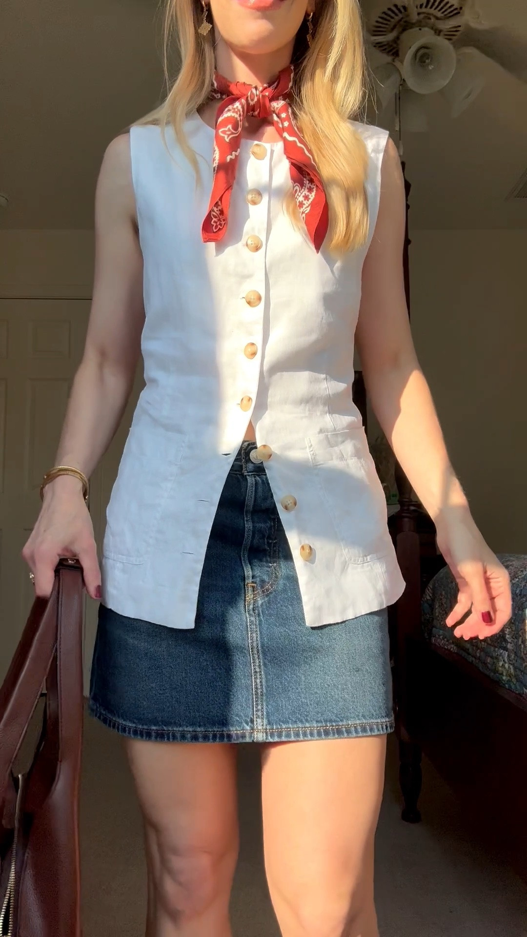 Late summer look with linen vest, silk bandana scarf, denim mini skirt (on sale @levi this weekend)

#LTKSaleAlert #LTKSeasonal #LTKOver40