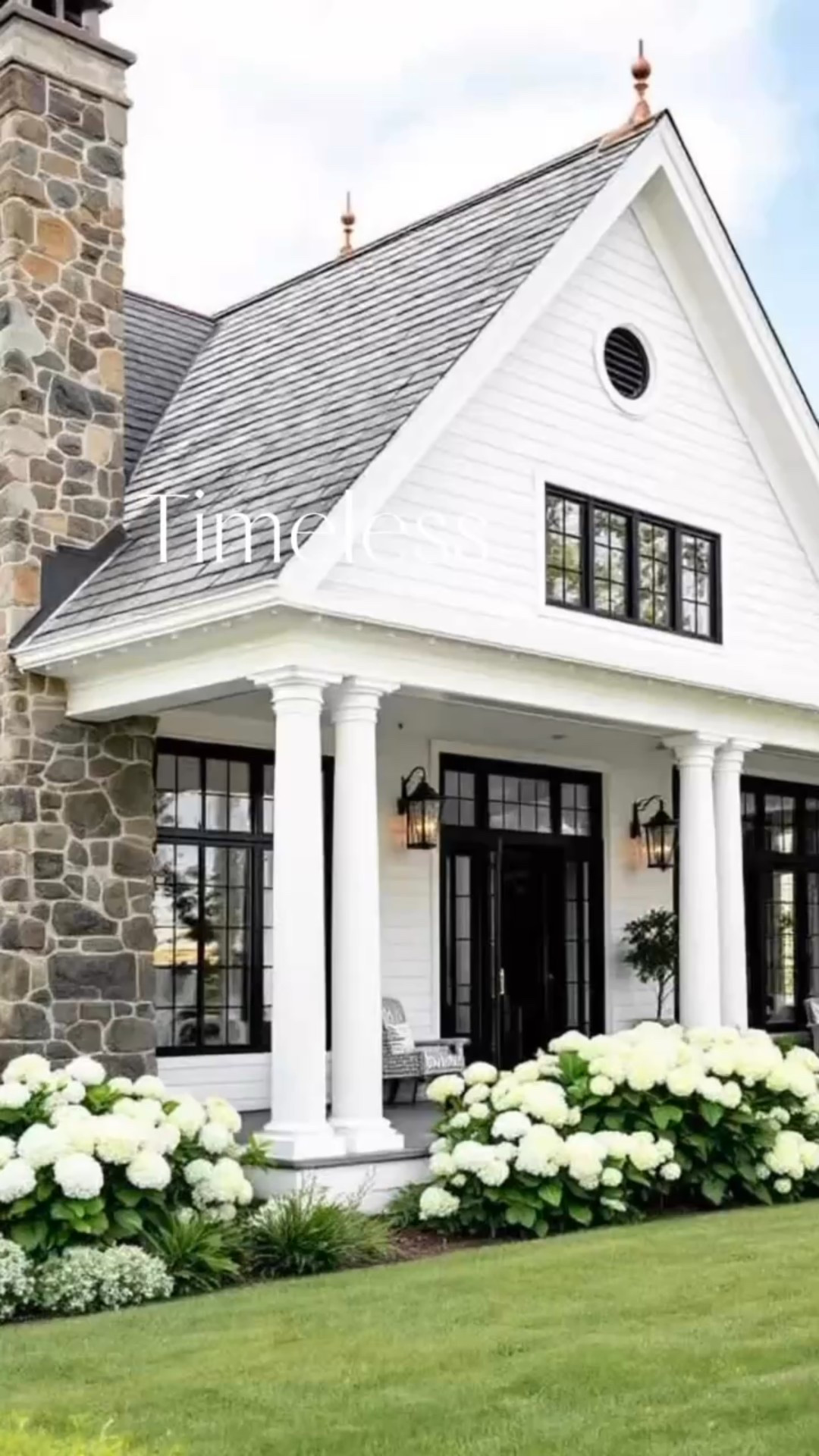 Caption:

A timeless beauty with classic charm — this elegant home features crisp white siding, bold black window frames, and a stately stone chimney that hints at warmth within. Lush white hydrangeas line the path to a welcoming front porch, setting the stage for a serene landscape. Step inside and you’ll find a light and airy interior with soaring ceilings, creamy walls, and rich dark wood accents — a perfect balance of softness and structure. The design leans traditional, with thoughtful millwork, antique-inspired lighting, and cozy textures that feel both elevated and inviting. A dream home where sophistication meets comfort.

#TraditionalHome
#ClassicCurbAppeal
#HydrangeaHeaven
#LightAndAiryInteriors
#TimelessDesign

#LTKHome #LTKStyleTip #LTKSeasonal