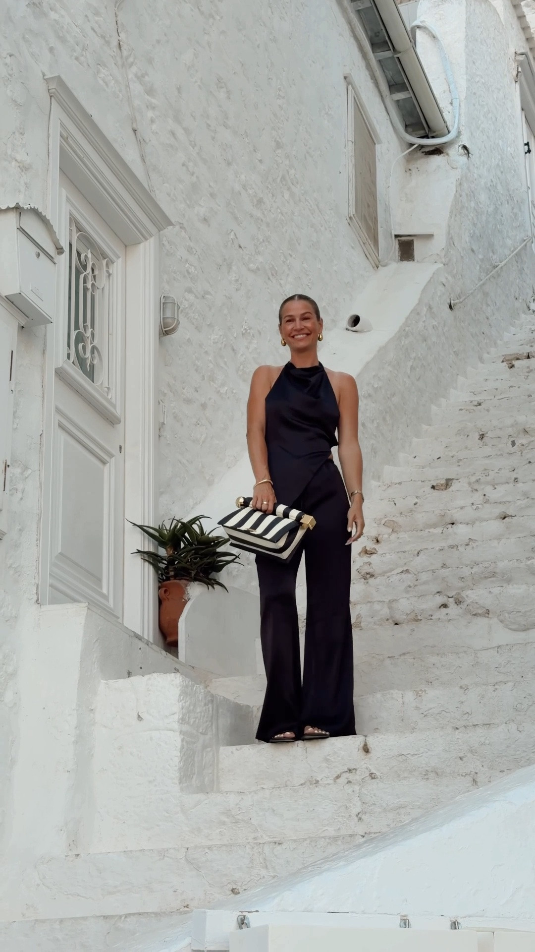 Black silky set worn in Greece

Exact set from Zara:
Top BLACK 2748/332/800
Pants BLACK 1255/480/800

Clutch:
La Pochette Rond Carrie x Jacquemus

#LTKTravel