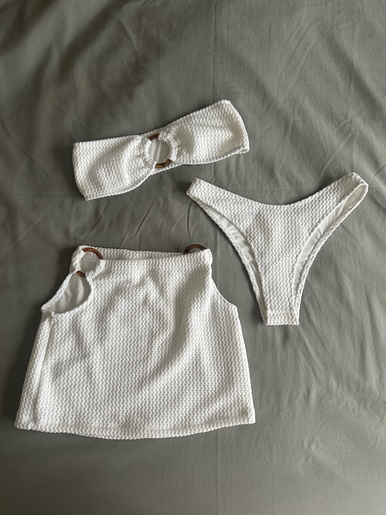 Ivory Bridal Summer Honeymoon Bachelorette Vacation Crochet set from Haute Swim 

Wearing a TTS small in top and bottom but had to size up to a M in the skirt 

#LTKWedding #LTKTravel #LTKSeasonal