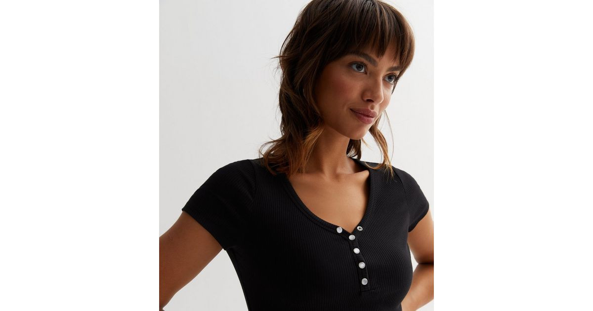 Black Ribbed Popper Front Crop T-Shirt
						
						Add to Saved Items
						Remove from Saved It... | New Look (UK)