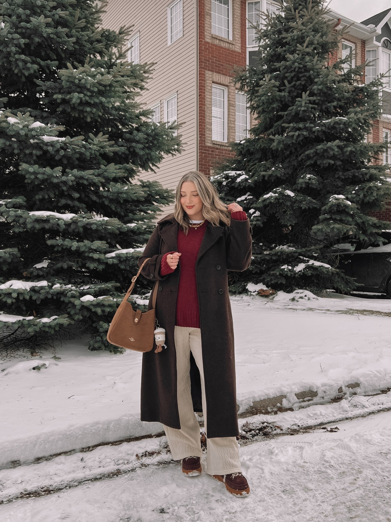 Comfy winter outfit! Cream cable knit wide leg lounge pants, wearing my usual size L. Also wearing L in the softest burgundy chenille sweater. I love the high neck on this white tee for layering! Wearing L. This chocolate brown wool trench coat is such a good winter staple piece, wearing L. My Sorel snow boots are waterproof and so warm! Consider sizing up if you plan to wear thick socks


#LTKwinter #LTKsale #LTKmidsize