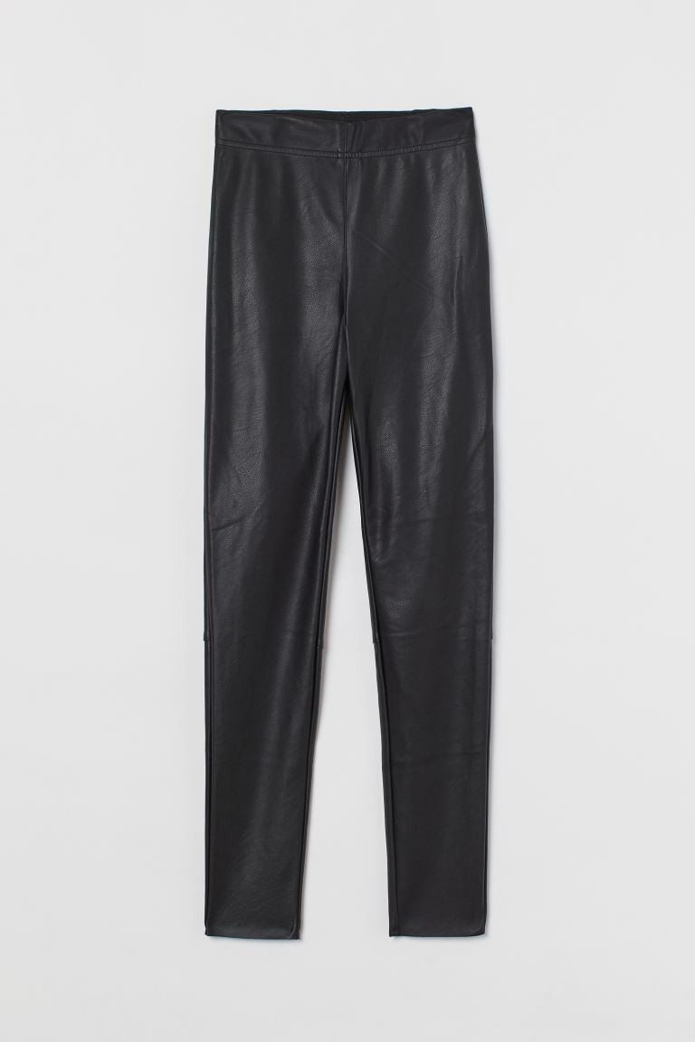 Leggings in faux leather. High waist and concealed, elasticized waistband. Seam at back of knees ... | H&M (US, CA, MX)