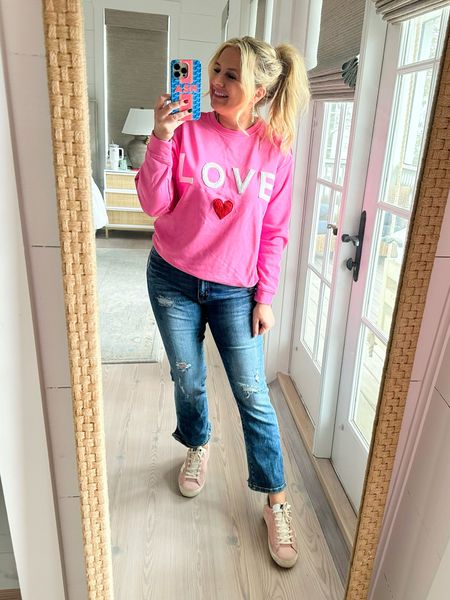 Cutest L O V E sweatshirt. Wearing a small but you could easily size up to go with a more oversized vibe! Code FANCY15 will get you 15% off  

#LTKSeasonal #LTKfindsunder100 #LTKstyletip