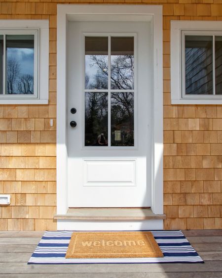 Love the front porch at the Making Waves beach house in Barnstable Village on Cape Cod!  If you're looking for a summer beach rental, be sure to mention Casually Coastal during the booking process for a free gift card to Osterville Fish Too!

home decor, coastal decor, beach house decor, beach decor, beach style, coastal home, coastal home decor, coastal decorating, coastal interiors, coastal house decor, striped doormat, coastal outdoor mat, oversized doormat, navy striped doormat, porch decor, front steps decor, amazon doormat, amazon rugs, amazon indoor/outdoor rug, coir outdoor mat, welcome mat


#LTKhome #LTKfindsunder50 #LTKstyletip