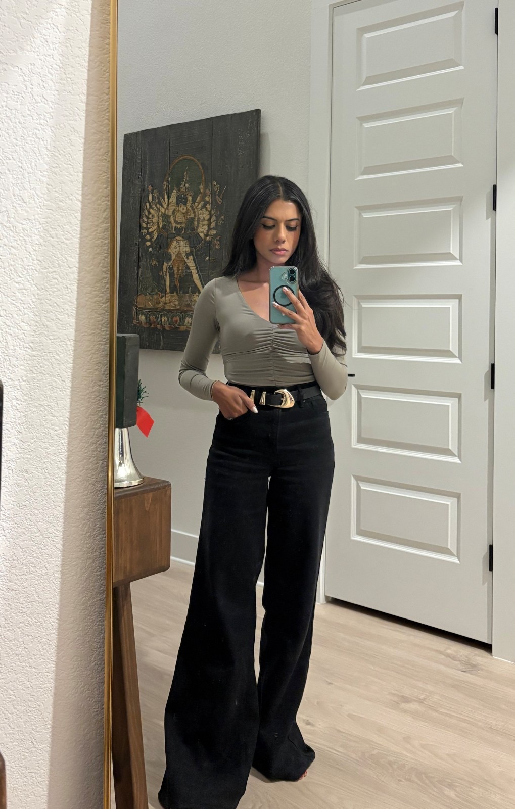 Petite friendly winter ootd ft a tan v. neck bodysuit from Abercrombie in XS, wide leg black denim from good American in 00

#LTKgrwm #LTKPetite #LTKootd