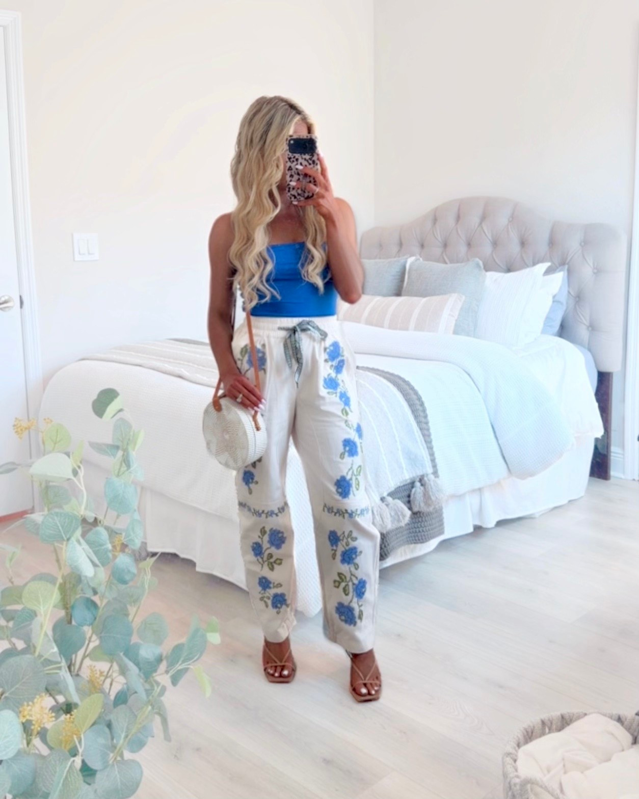 Trendy spring outfit styled with highwaisted floral barrel jeans + a matching blue strapless top. 

Casual spring outfit, spring fashion trends 2026, floral pants, floral jeans, barrel pants, white pants, white jeans, 

#LTKootd #LTKSeasonal #LTKSaleAlert