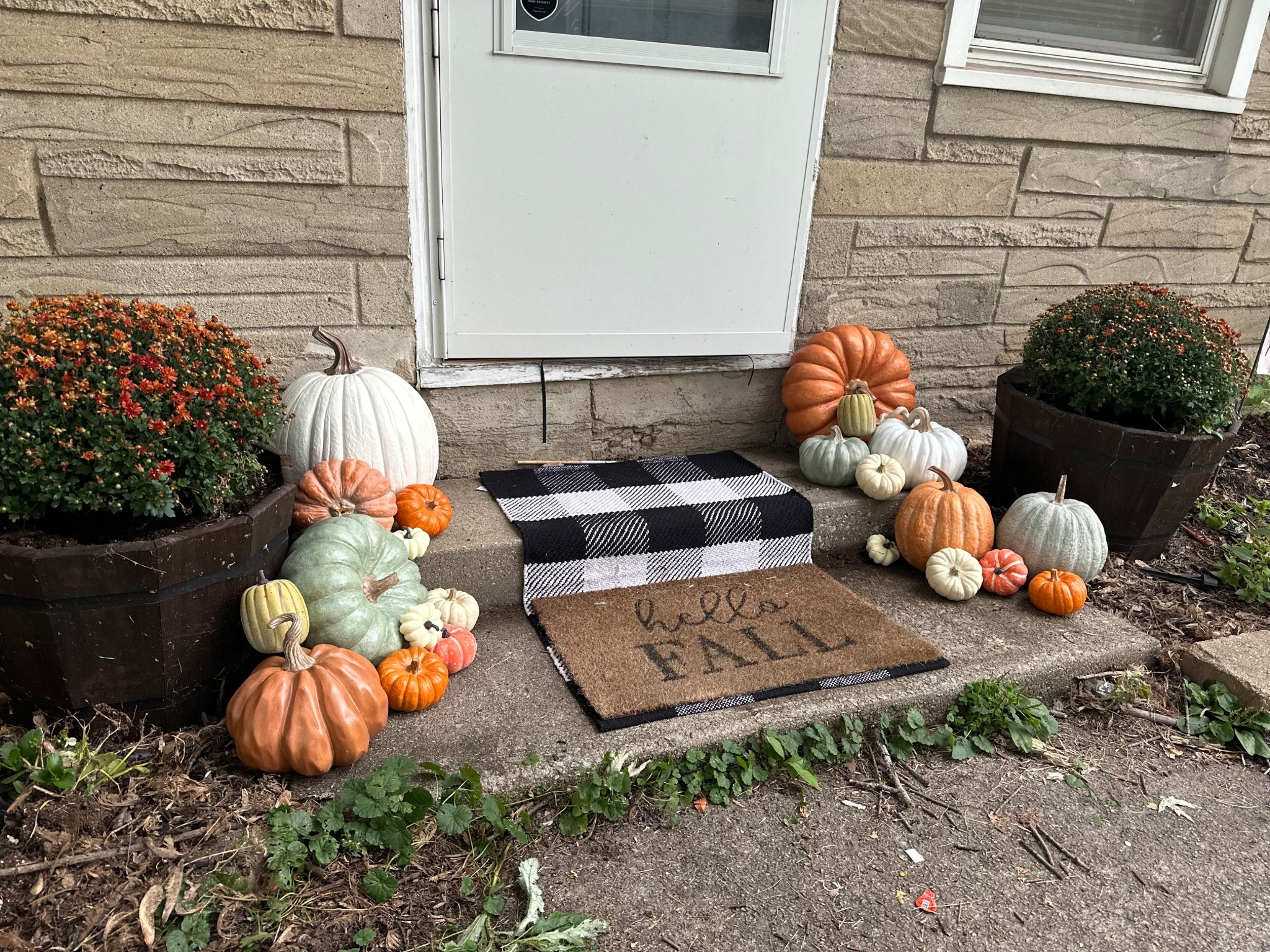 🍂 Hello, Fall! 🍂✨ Nothing says cozy season like pumpkins, mums, and a cute layered doormat moment. I love mixing different pumpkin shapes, colors, and sizes to give my front porch that warm, welcoming fall vibe. The buffalo check rug layered under the “Hello Fall” mat really pulls it all together. 🖤🤍🧡

Perfect for creating that picture-worthy entrance for the season. 🍁✨

#LTKSeasonal #LTKFallSale #LTKHome