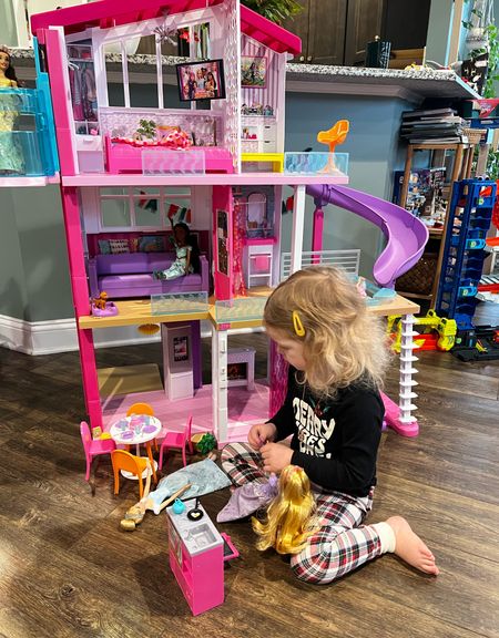 This Barbie dream house was definitely the winner on Christmas morning. We debated two versions and chose the purple slide because it was slightly less wide - still 3 feet wide! 

#LTKfamily #LTKkids