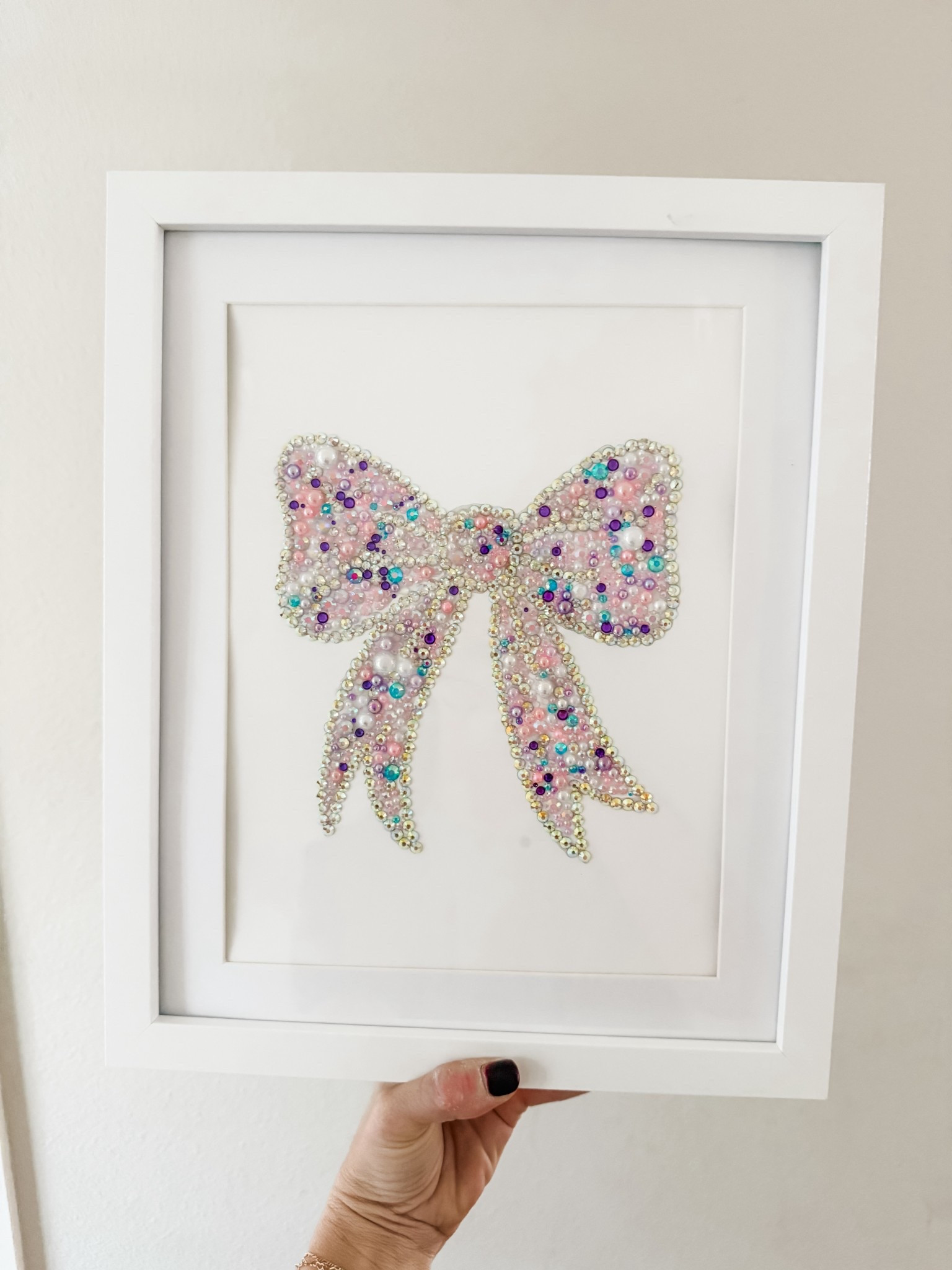 I made this for Brooklyn’s room and you can make one too! Just rhinestone a bow outline (template will be on my website soon) and rhinestone and frame! 

#LTKmomlife #LTKKids #LTKHome